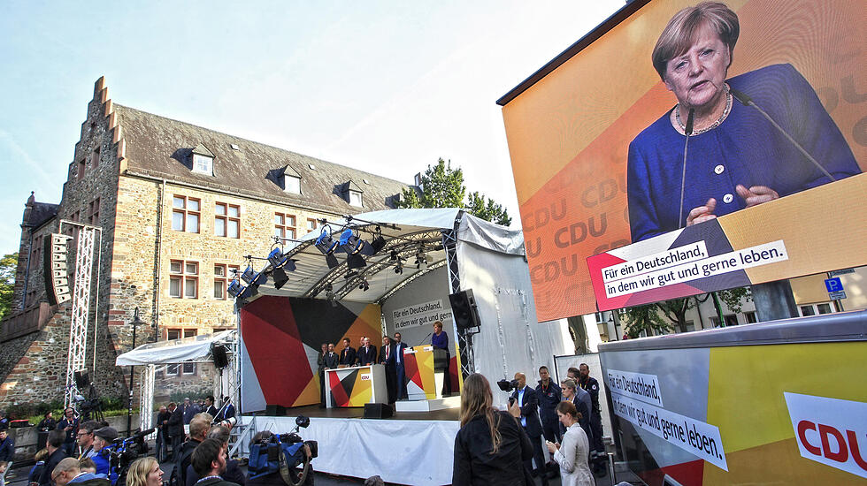 Großer Wahlkampftag in Gießen: Merkel-Besuch und NPD-Kundgebung